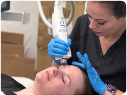 woman getting her facial treatment by specialist rejuvimed doctor